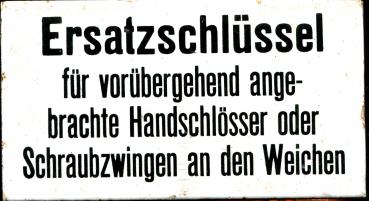 Emailleschild Ersatzschlüssel für vorübergehend angebrachte Handschlösser oder Schraubzwingen an den Weichen